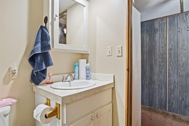 114166 S 4209th Rd, Eufaula, OK 74432 - bathroom with vanity, wood finished floors, and toilet