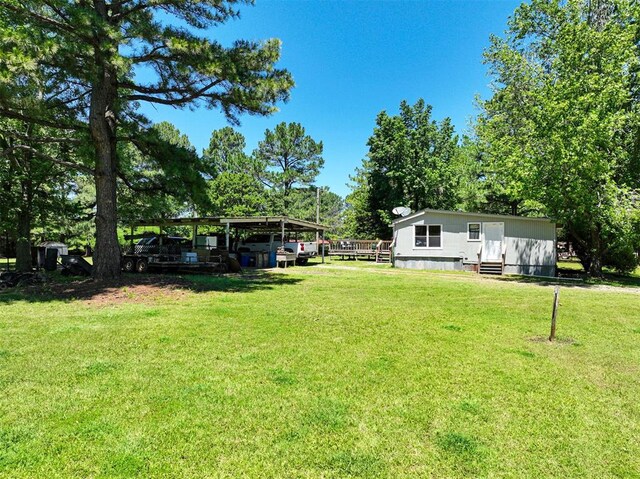 114166 S 4209th Rd, Eufaula, OK 74432 - view of green lawn featuring a carport and entry steps