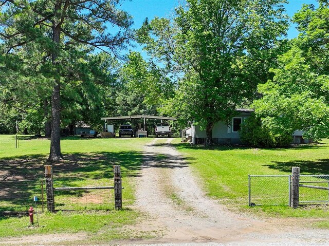 114166 S 4209th Rd, Eufaula, OK 74432 - view of front of house with driveway and a carport