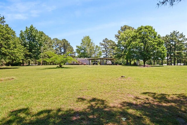 114166 S 4209th Rd, Eufaula, OK 74432 - view of green lawn featuring a carport