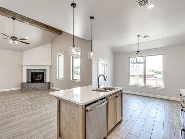 2716 Dunham Dr, Norman, OK 73071 - kitchen with a sink, stainless steel dishwasher, baseboards, light wood-type flooring, and a ceiling fan