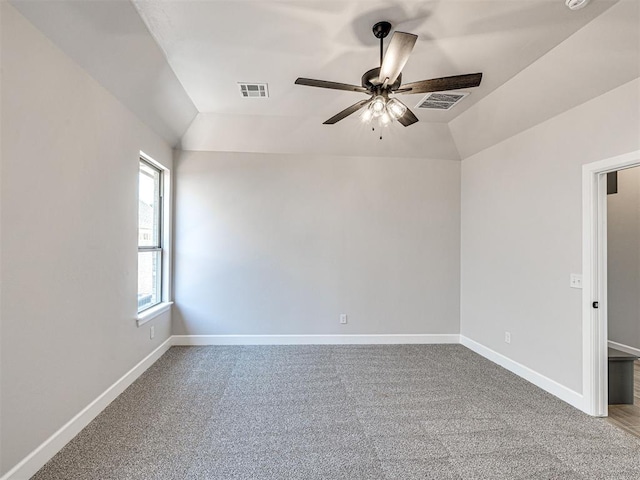 2716 Dunham Dr, Norman, OK 73071 - spare room with a ceiling fan, carpet, baseboards, and vaulted ceiling