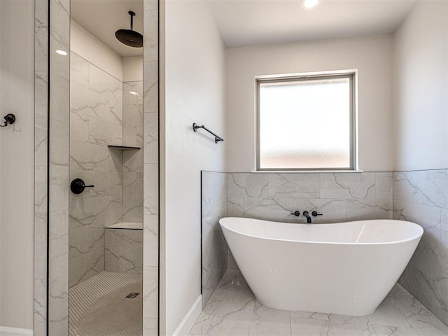 2716 Dunham Dr, Norman, OK 73071 - full bath with marble tiled floors, a soaking tub, and a tile shower