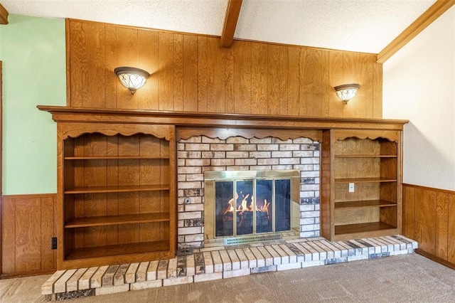 2613 SW 95th St, Oklahoma City, OK 73159 - detailed view of wood walls, wainscoting, a fireplace, and beam ceiling