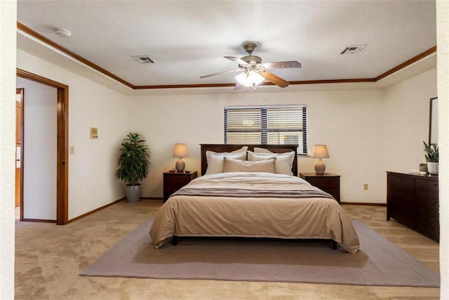 2613 SW 95th St, Oklahoma City, OK 73159 - bedroom with ornamental molding, light carpet, baseboards, and a ceiling fan
