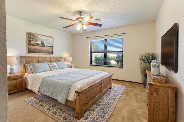 2613 SW 95th St, Oklahoma City, OK 73159 - bedroom featuring light carpet, a ceiling fan, and baseboards