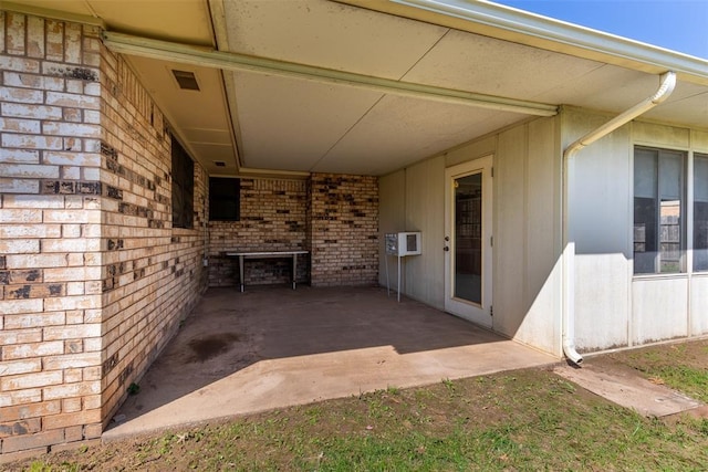 2613 SW 95th St, Oklahoma City, OK 73159 - view of patio featuring a carport
