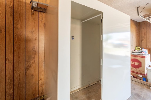 2613 SW 95th St, Oklahoma City, OK 73159 - bathroom with wood walls and concrete floors