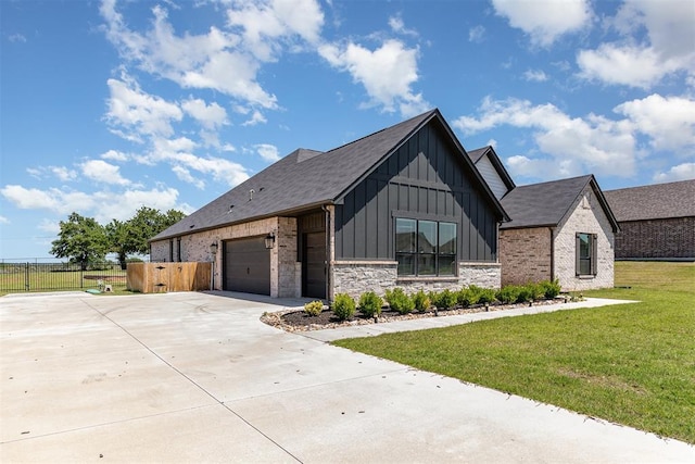 2246 Jackson Ln, Blanchard, OK 73010 - view of front facade featuring board and batten siding, driveway, and a garage