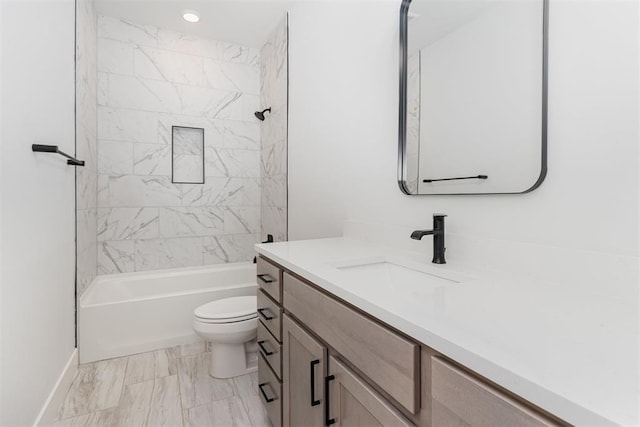 2246 Jackson Ln, Blanchard, OK 73010 - full bathroom featuring toilet, vanity, marble look tiles, shower / bath combination, and baseboards