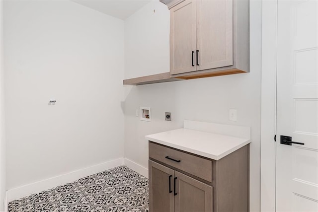 2246 Jackson Ln, Blanchard, OK 73010 - laundry room with hookup for an electric dryer, baseboards, washer hookup, and cabinet space