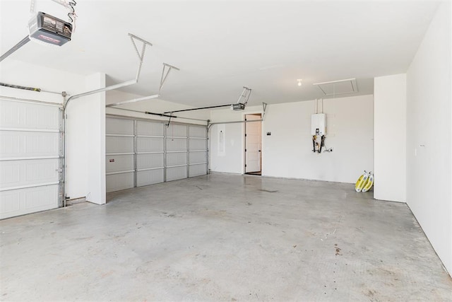 2246 Jackson Ln, Blanchard, OK 73010 - garage featuring a garage door opener