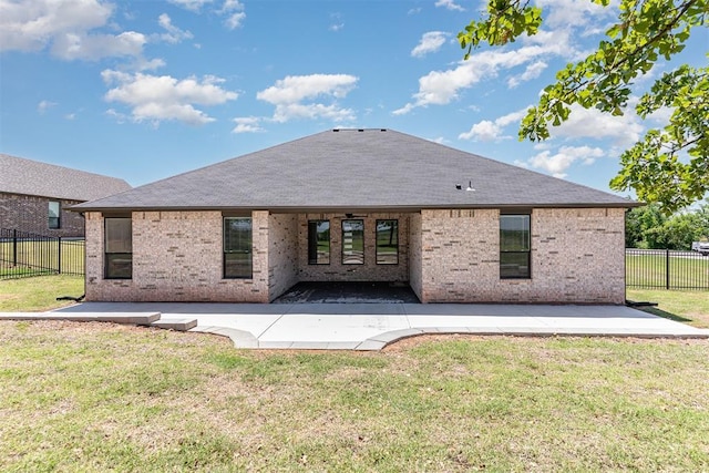 2246 Jackson Ln, Blanchard, OK 73010 - rear view of house featuring a patio, brick siding, and a shingled roof