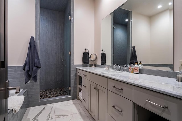 4400 NW 150th St, Oklahoma City, OK 73134 - bathroom with marble look tile flooring, vanity, a stall shower, and recessed lighting