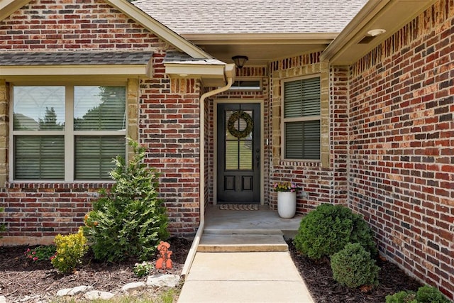 12360 Hidden Run Rd, Guthrie, OK 73044 - doorway to property with brick siding and roof with shingles
