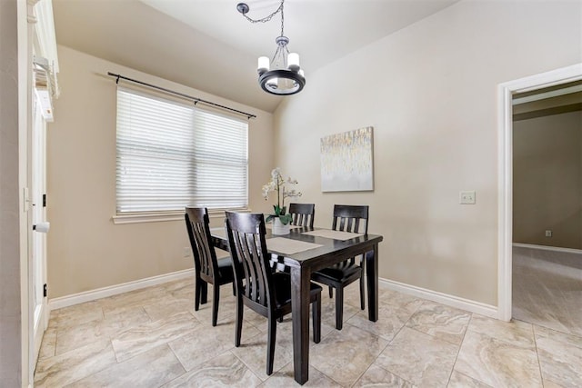 12360 Hidden Run Rd, Guthrie, OK 73044 - dining space featuring a chandelier, vaulted ceiling, and baseboards