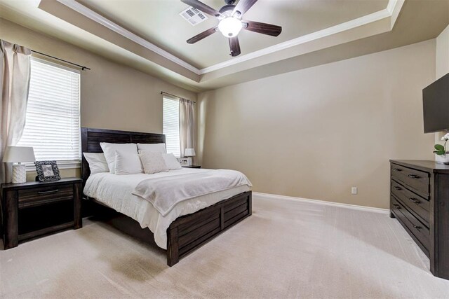 12360 Hidden Run Rd, Guthrie, OK 73044 - bedroom with a raised ceiling, ornamental molding, light colored carpet, baseboards, and ceiling fan
