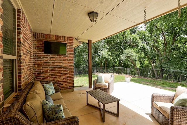 12360 Hidden Run Rd, Guthrie, OK 73044 - view of patio featuring an outdoor hangout area, a fenced backyard, and view of wooded area