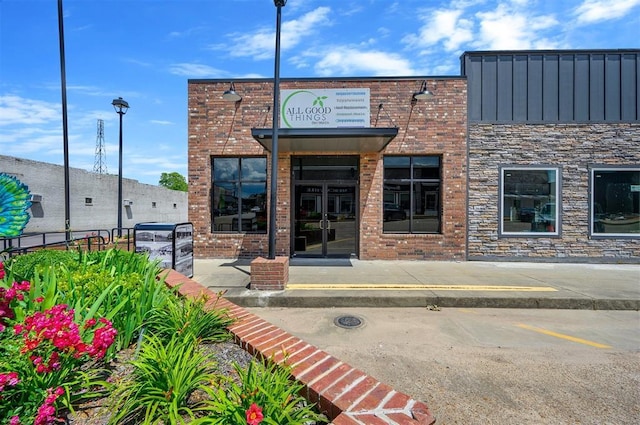 124 N Main St, Broken Bow, OK 74728 - view of building exterior with uncovered parking