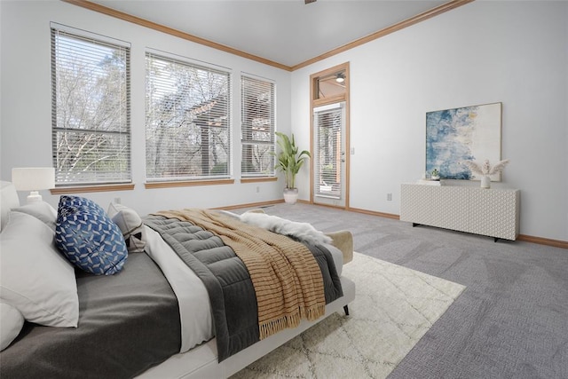 carpeted bedroom with multiple windows, access to outside, crown molding, and baseboards