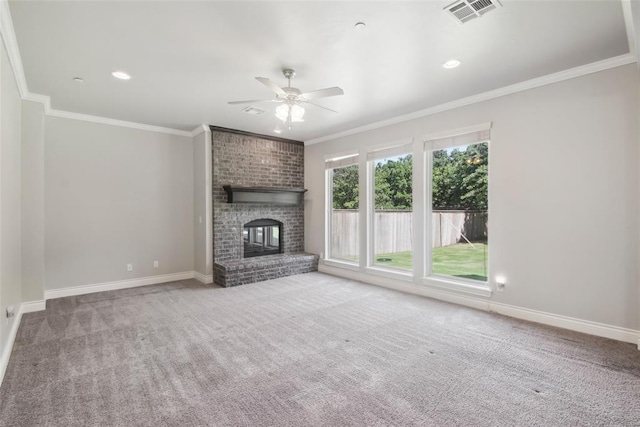5625 Courtland Ln, Choctaw, OK 73020 - unfurnished living room featuring ceiling fan, carpet floors, baseboards, ornamental molding, and a fireplace