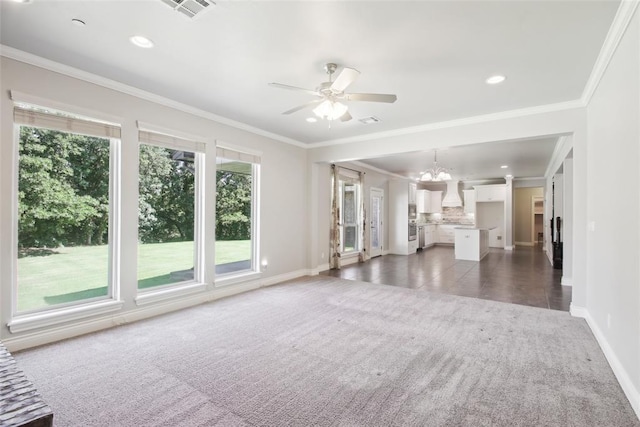 5625 Courtland Ln, Choctaw, OK 73020 - unfurnished living room featuring dark carpet, a chandelier, baseboards, ornamental molding, and ceiling fan