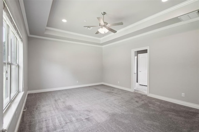 5625 Courtland Ln, Choctaw, OK 73020 - carpeted spare room featuring a raised ceiling, ceiling fan, baseboards, crown molding, and recessed lighting