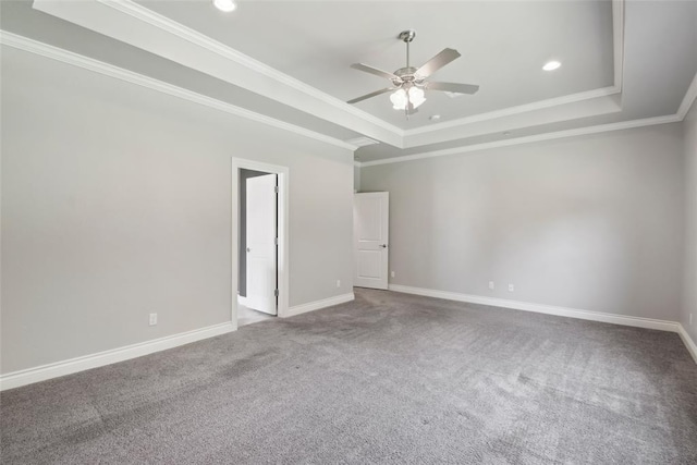 5625 Courtland Ln, Choctaw, OK 73020 - carpeted empty room with a tray ceiling, ceiling fan, ornamental molding, baseboards, and recessed lighting