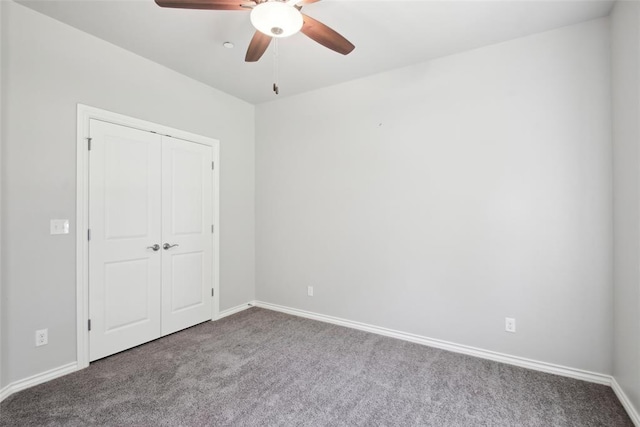 5625 Courtland Ln, Choctaw, OK 73020 - unfurnished bedroom featuring carpet flooring, baseboards, a closet, and a ceiling fan