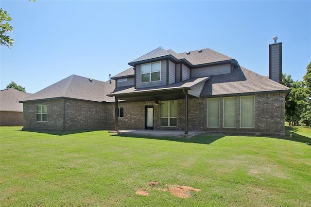 5625 Courtland Ln, Choctaw, OK 73020 - back of property with a patio area, brick siding, a lawn, and a chimney
