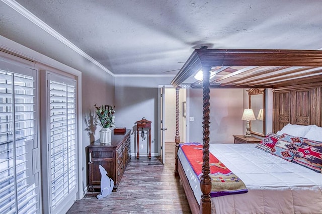 3517 Brookford Dr, Norman, OK 73072 - bedroom with wood finished floors, a textured ceiling, ornamental molding, and baseboards