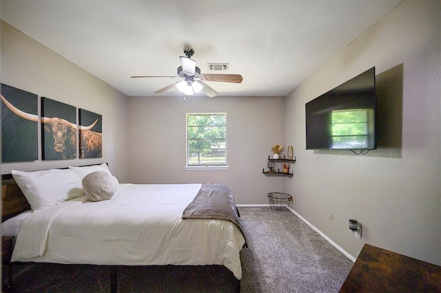 308 E Highland St, Hugo, OK 74743 - bedroom featuring carpet, baseboards, and ceiling fan