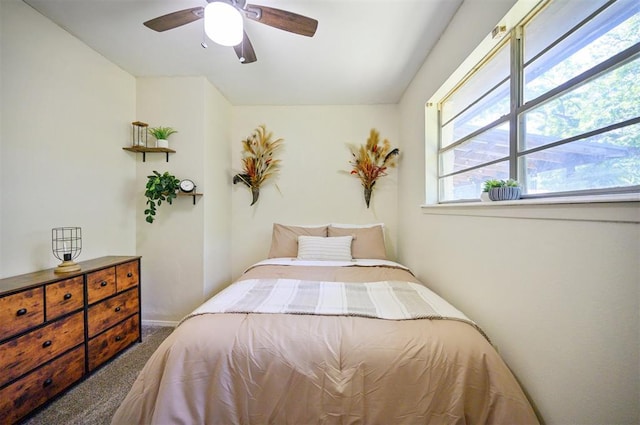 308 E Highland St, Hugo, OK 74743 - bedroom featuring carpet and a ceiling fan