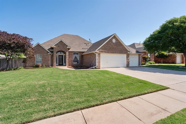 3005 Summit Hill Rd, Norman, OK 73071 - traditional home featuring an attached garage, brick siding, concrete driveway, and a shingled roof