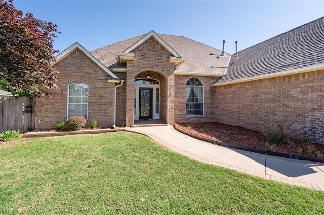 3005 Summit Hill Rd, Norman, OK 73071 - view of front of home featuring a shingled roof and brick siding