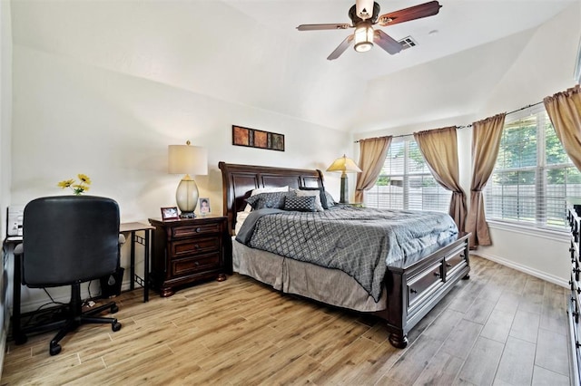 3005 Summit Hill Rd, Norman, OK 73071 - bedroom with vaulted ceiling, light wood-type flooring, baseboards, and ceiling fan