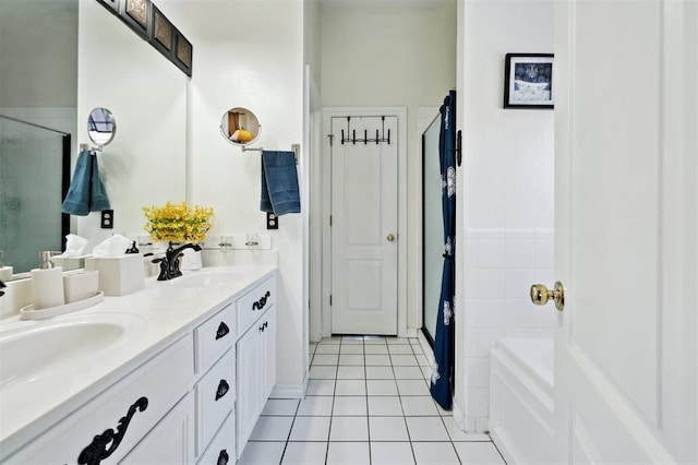 3005 Summit Hill Rd, Norman, OK 73071 - full bath with tile patterned floors, double vanity, a shower with shower door, and a garden tub