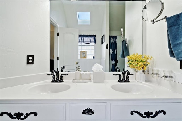 3005 Summit Hill Rd, Norman, OK 73071 - full bathroom with a skylight and double vanity