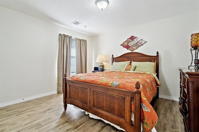 3005 Summit Hill Rd, Norman, OK 73071 - bedroom featuring light wood-type flooring and baseboards