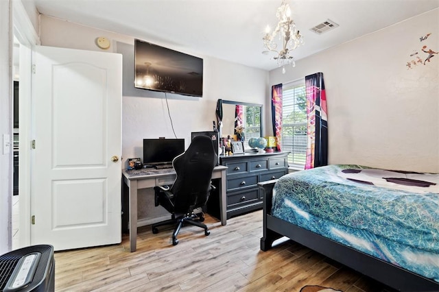 3005 Summit Hill Rd, Norman, OK 73071 - bedroom featuring a chandelier, light wood-type flooring, and a desk