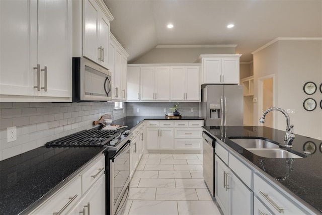 6812 NW 149th St, Oklahoma City, OK 73142 - kitchen featuring appliances with stainless steel finishes, white cabinets, dark stone counters, ornamental molding, and vaulted ceiling