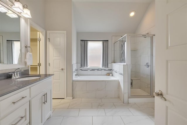 6812 NW 149th St, Oklahoma City, OK 73142 - bathroom with vaulted ceiling, a garden tub, vanity, a shower stall, and marble look tile flooring