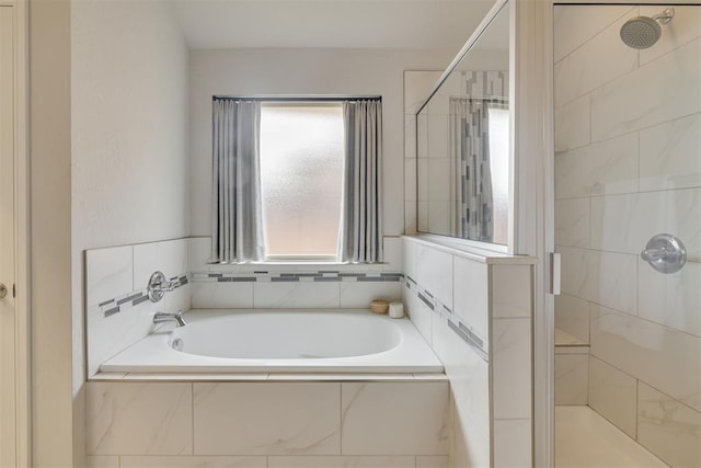 6812 NW 149th St, Oklahoma City, OK 73142 - bathroom featuring a shower stall and a bath