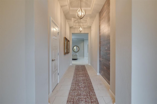6812 NW 149th St, Oklahoma City, OK 73142 - corridor with a chandelier, light marble finish floors, and coffered ceiling