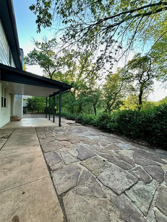 4008 Creekwood, Edmond, OK 73025 - view of patio featuring concrete driveway