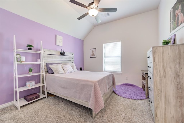 bedroom featuring carpet flooring, vaulted ceiling, ceiling fan, and baseboards