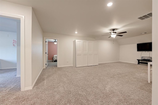 unfurnished living room featuring carpet floors, ceiling fan, recessed lighting, and baseboards