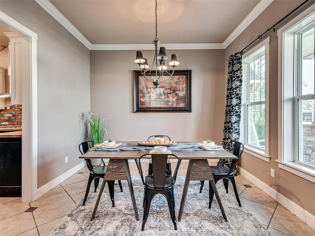 24051 Hester Cir, Washington, OK 73093 - dining room with light tile patterned floors, a chandelier, ornamental molding, and baseboards