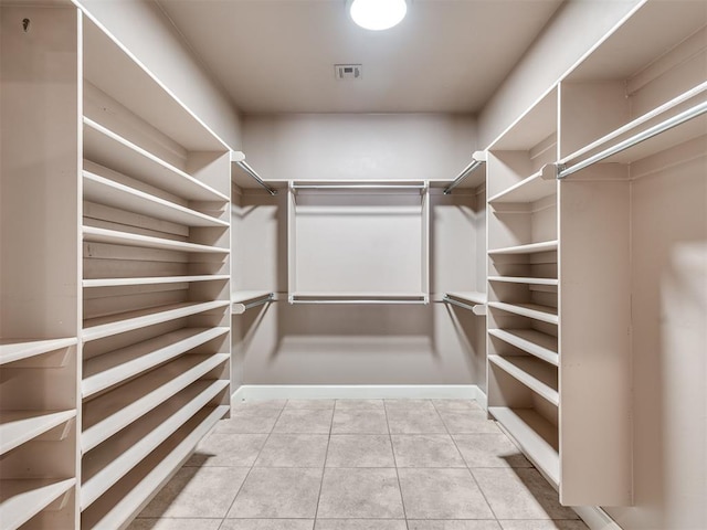 24051 Hester Cir, Washington, OK 73093 - spacious closet featuring tile patterned flooring