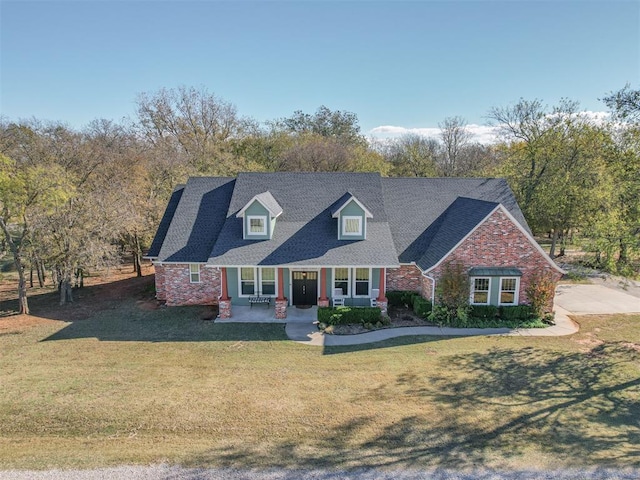 24051 Hester Cir, Washington, OK 73093 - cape cod-style house featuring a front lawn and a porch